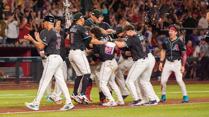 The Diamondbacks team celebrates a walk-off win