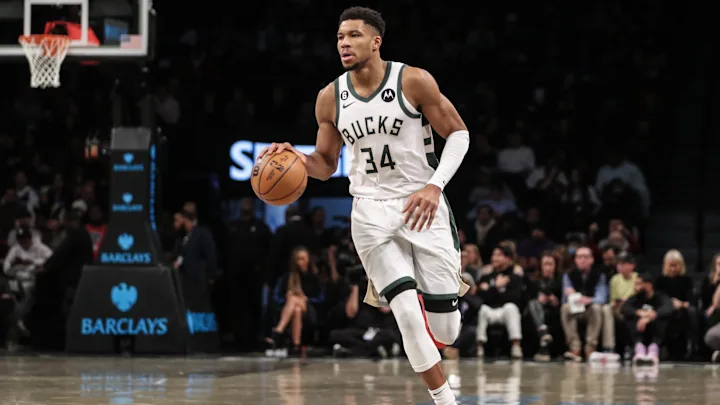 Giannis moves to defend and Brunson delivers a tight pass.