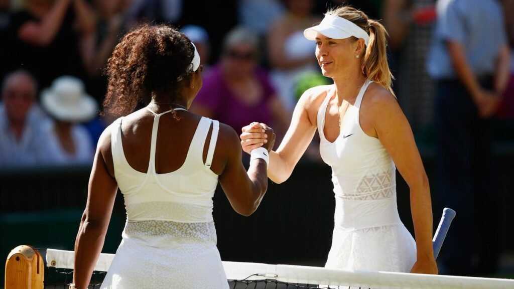Action shot of Sharapova and Serena Williams in the middle of a rally, showing intensity and skill.