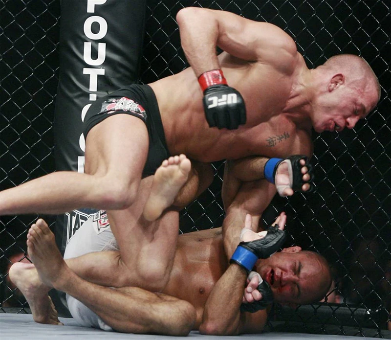 GSP is controlling Penn at cageside while looking for opportunities.