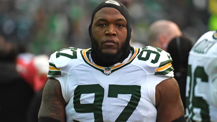 Split graphic of Parsons in a Packers jersey and Clark in a Cowboys jersey.