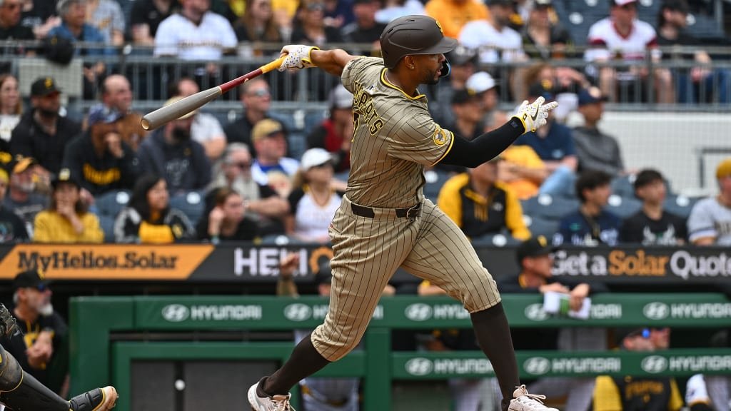 Bogaerts raising his hand toward the dugout after his two-run double.