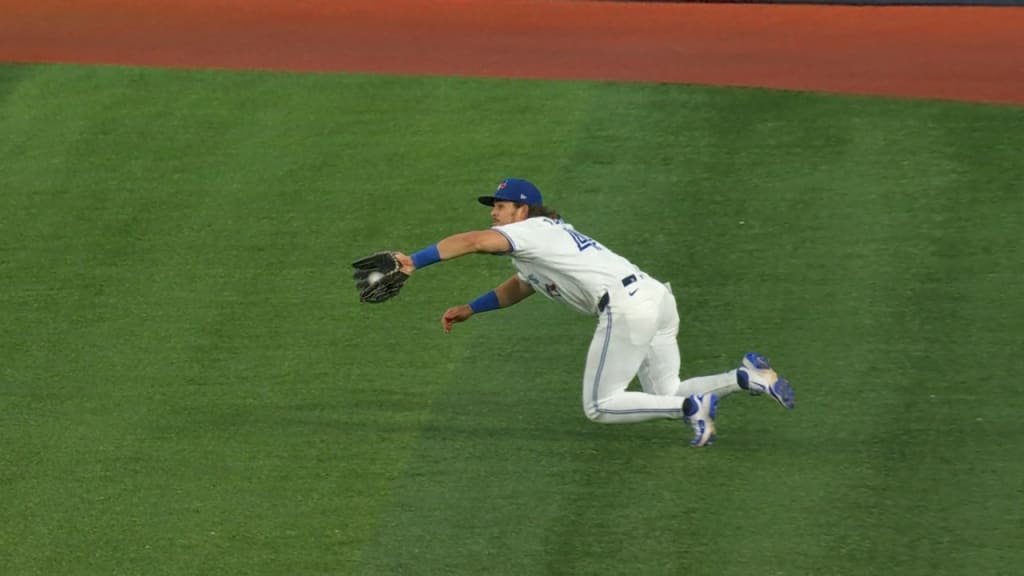 Barger moves in to make the catch, with his teammate covering second base.